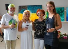 Exhibitors with curator Clara Teleki